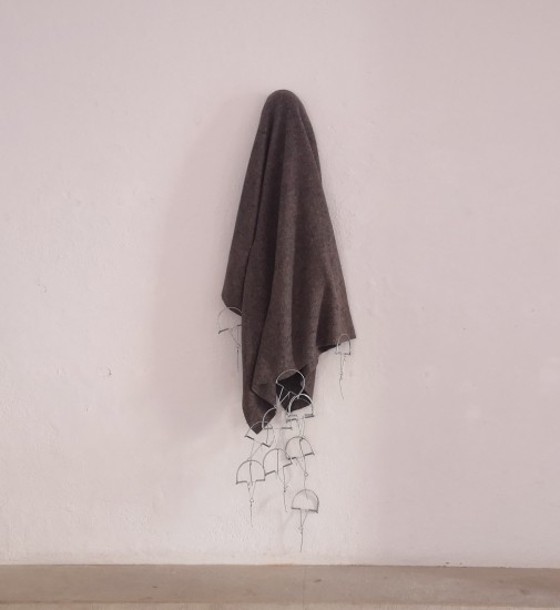 "Pendant", 2018, Hanger, blankets and bird traps, 180 x 60 x 17 cm
